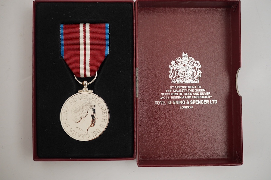 A collection of medal related items, etc., including